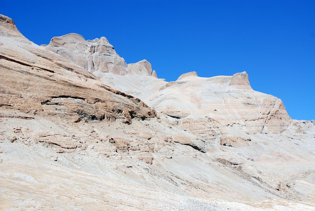 20 Gesar Ling Peak And Saddle Of Gesar On The West Side Of Lha Chu Valley On Mount Kailash Outer Kora The peak north of Ushinisha Vijaya is called Gesar Ling Peak, named after the hero-king of Tibets folk story. The rock ridge below is called the saddle of Gesar.